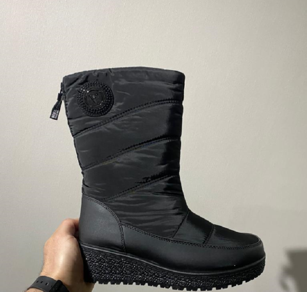 BOTA IMPERMEABLE MEDIA PIERNA